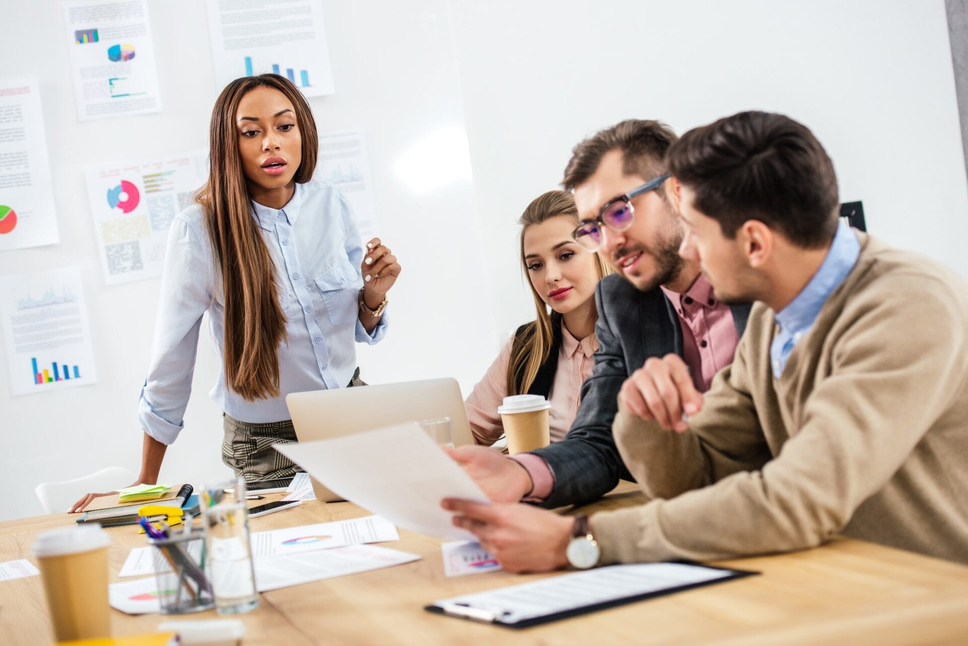 multicultural-group-of-marketing-managers-working-on-project-together-in-office.jpg